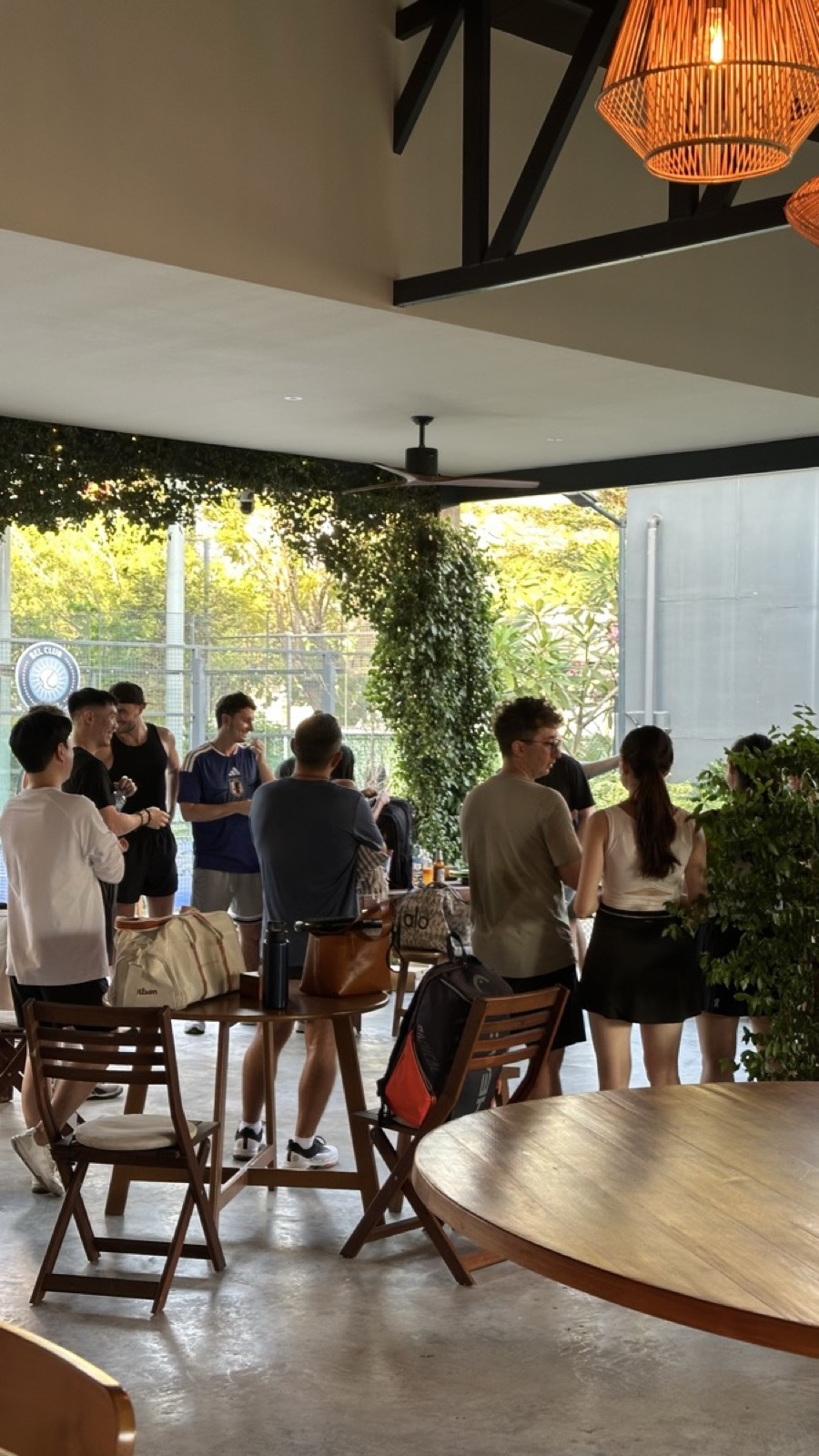 Members socializing at the Bel Club 22 clubhouse